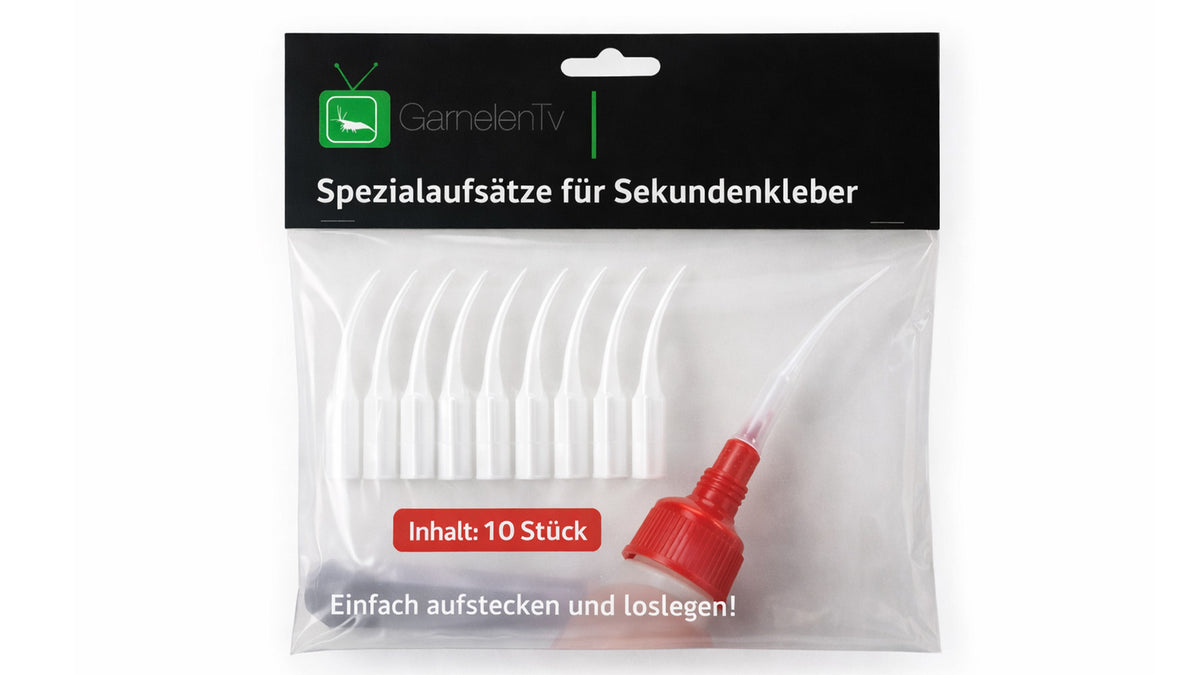 Anwendungsbeispiel der Spezialaufsätze beim Fixieren von Moos auf einer Wurzel. Das Foto zeigt, wie die lange, flexible Spitze selbst in tiefe Ritzen reicht, um den Sekundenkleber ohne Verschmieren zu platzieren.